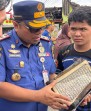 Ditengah Abu Kebakaran, Alquran Tetap Utuh Jadi Pengingat Kuasa Allah